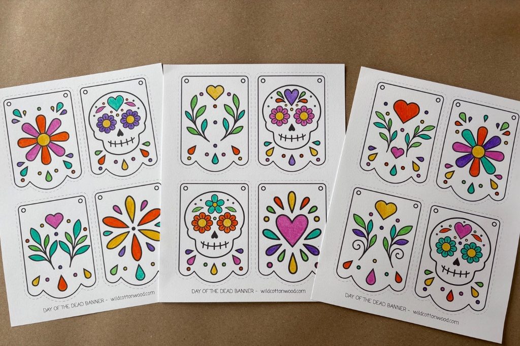 Twelve Día de los Muertos banner designs arranged on three printable pages
